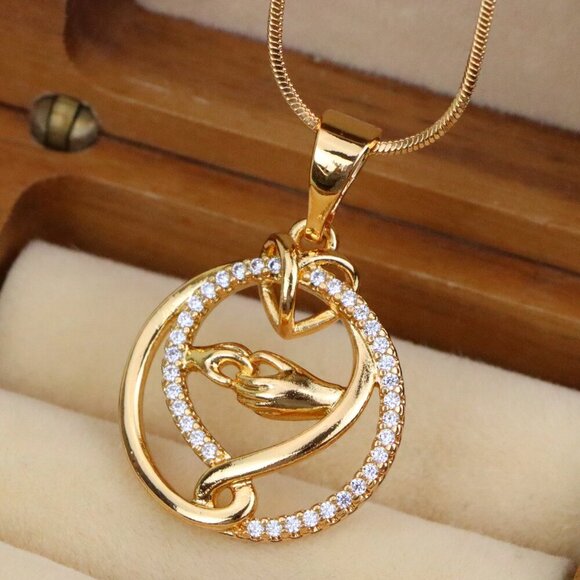 "Graceful Hand & Heart Rose Gold Pendant – Sparkling Circle Design, XPPT1554 - Picture 1 of 13